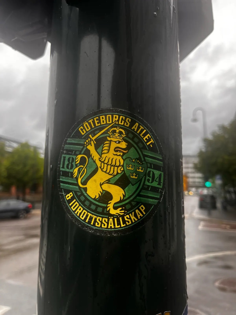 Supporter sticker on a lamppost